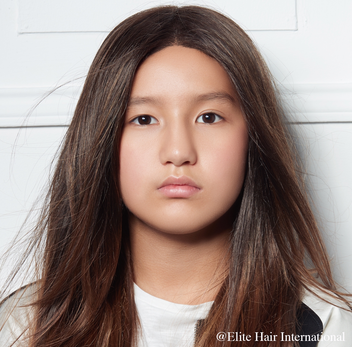 Portrait d'une ado portant la perruque pour enfant Ariane, 100% remboursée d'Elite Hair International