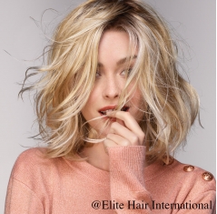 Portrait femme portant la perruque Etincelle*, en cheveux de synthèse, Elite Hair International